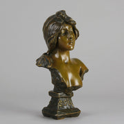 Silvia by Emmanuel Villanis a very fine late 19th Century French bronze bust of an attractive classical maiden modelled in the Art Nouveau style, with fabulous multi hued patination of brown and a subtle green
