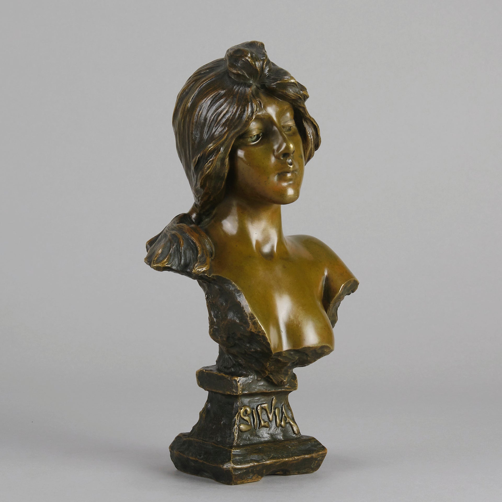 Silvia by Emmanuel Villanis a very fine late 19th Century French bronze bust of an attractive classical maiden modelled in the Art Nouveau style, with fabulous multi hued patination of brown and a subtle green