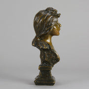 Silvia by Emmanuel Villanis a very fine late 19th Century French bronze bust of an attractive classical maiden modelled in the Art Nouveau style, with fabulous multi hued patination of brown and a subtle green
