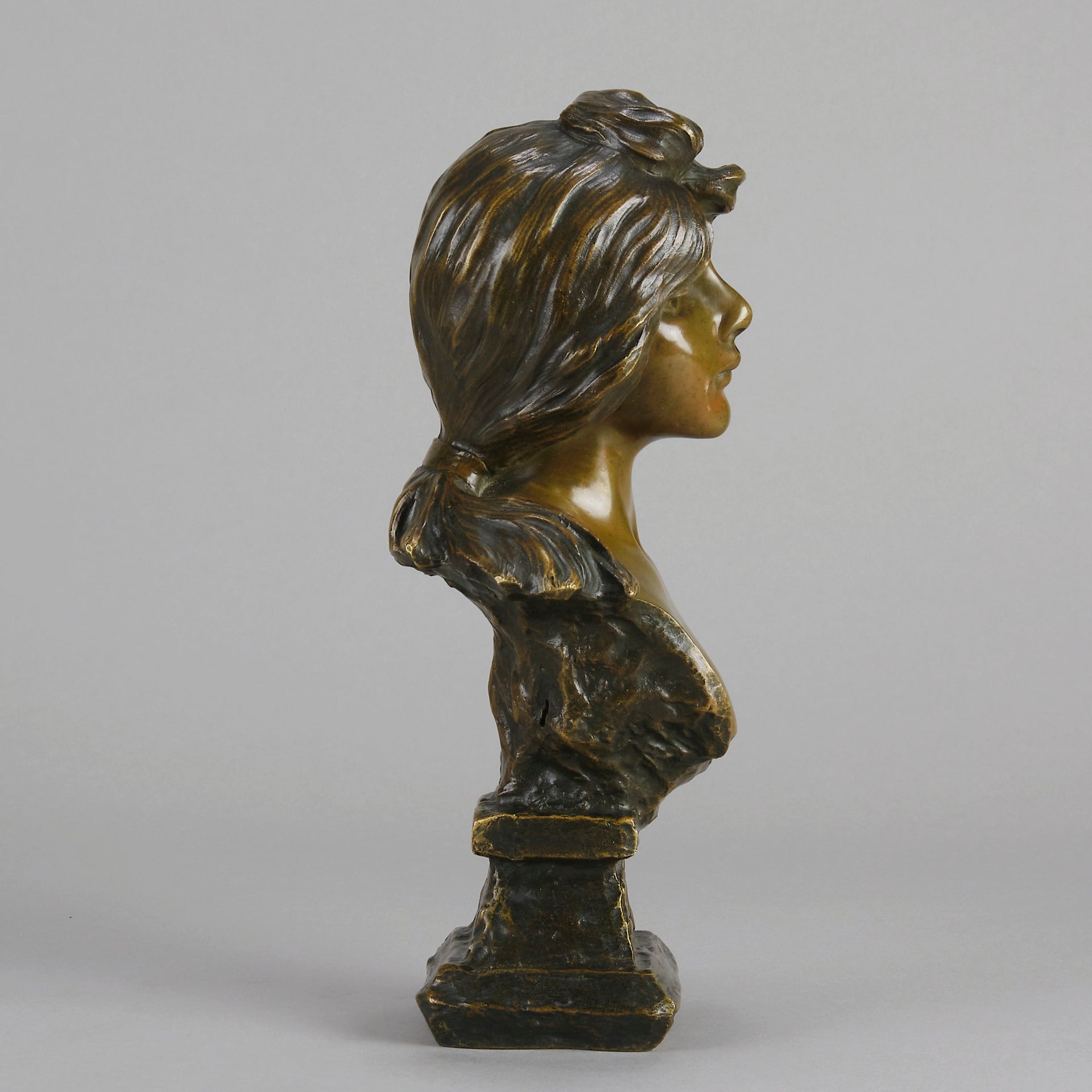 Silvia by Emmanuel Villanis a very fine late 19th Century French bronze bust of an attractive classical maiden modelled in the Art Nouveau style, with fabulous multi hued patination of brown and a subtle green