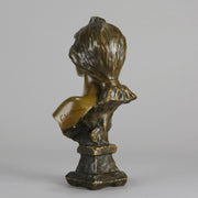 Silvia by Emmanuel Villanis a very fine late 19th Century French bronze bust of an attractive classical maiden modelled in the Art Nouveau style, with fabulous multi hued patination of brown and a subtle green