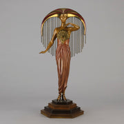 Le Soleil by Erte Art Deco bronze of a beautiful young woman in diaphanous dress wearing a spectacular headdress of circular form representing the sun - Hickmet Fine Arts