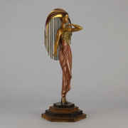 Le Soleil by Erte Art Deco bronze of a beautiful young woman in diaphanous dress wearing a spectacular headdress of circular form representing the sun - Hickmet Fine Arts