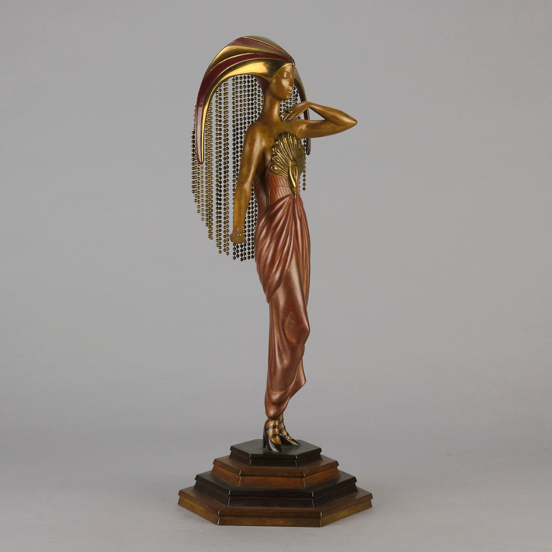 Le Soleil by Erte Art Deco bronze of a beautiful young woman in diaphanous dress wearing a spectacular headdress of circular form representing the sun - Hickmet Fine Arts