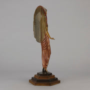 Le Soleil by Erte Art Deco bronze of a beautiful young woman in diaphanous dress wearing a spectacular headdress of circular form representing the sun - Hickmet Fine Arts