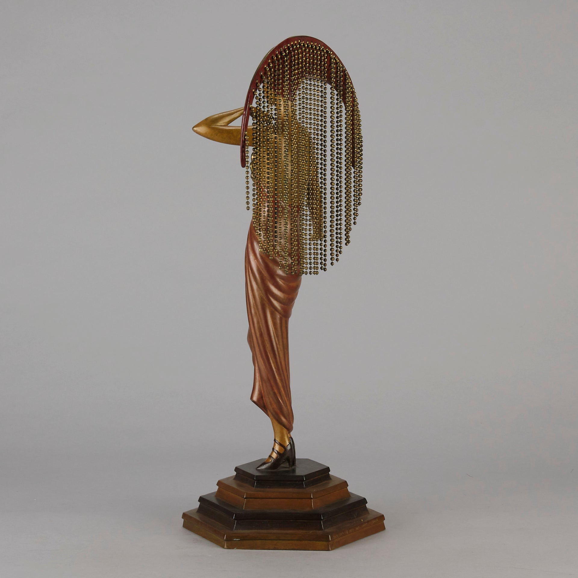 Le Soleil by Erte Art Deco bronze of a beautiful young woman in diaphanous dress wearing a spectacular headdress of circular form representing the sun - Hickmet Fine Arts