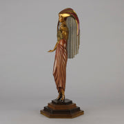 Le Soleil by Erte Art Deco bronze of a beautiful young woman in diaphanous dress wearing a spectacular headdress of circular form representing the sun - Hickmet Fine Arts