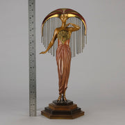 Le Soleil by Erte Art Deco bronze of a beautiful young woman in diaphanous dress wearing a spectacular headdress of circular form representing the sun - Hickmet Fine Arts