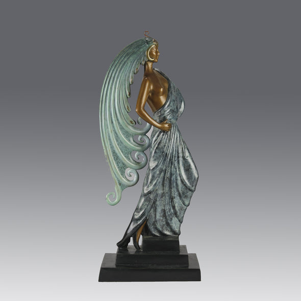  Beauty and the Beast by Erté a limited edition 20th Century bronze figure modelled as a beautiful young woman walking up a set of stairs wearing an impressive headdress and draped in a panther fur 
