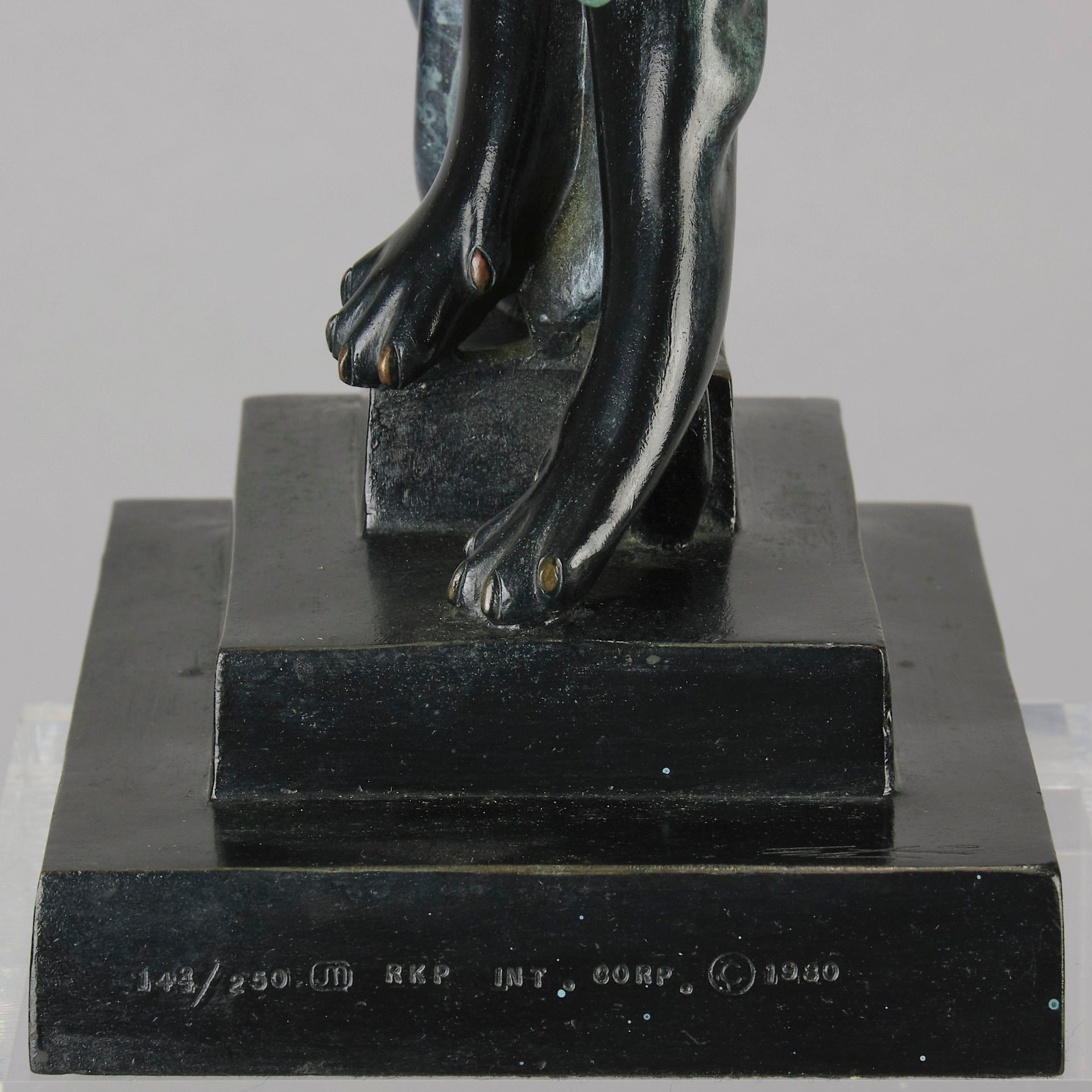  Beauty and the Beast by Erté a limited edition 20th Century bronze figure modelled as a beautiful young woman walking up a set of stairs wearing an impressive headdress and draped in a panther fur 