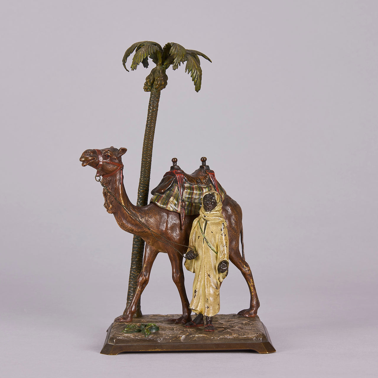 “Bedouin with camel under Palm Tree” by Franz Bergman
