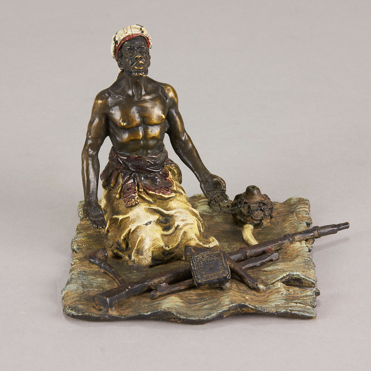 "Seated Arms Dealer" by Franz Bergman