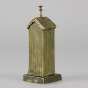 Bathing Belle by Franz Bergman an amusingly erotic early 20th Century Austrian bronze figure of a young beauty in a seaside hut peeking out between the curtains. The mechanism pushes down to turn the front curtain around revealing 'what the butler saw' as her naked body is revealed from behind