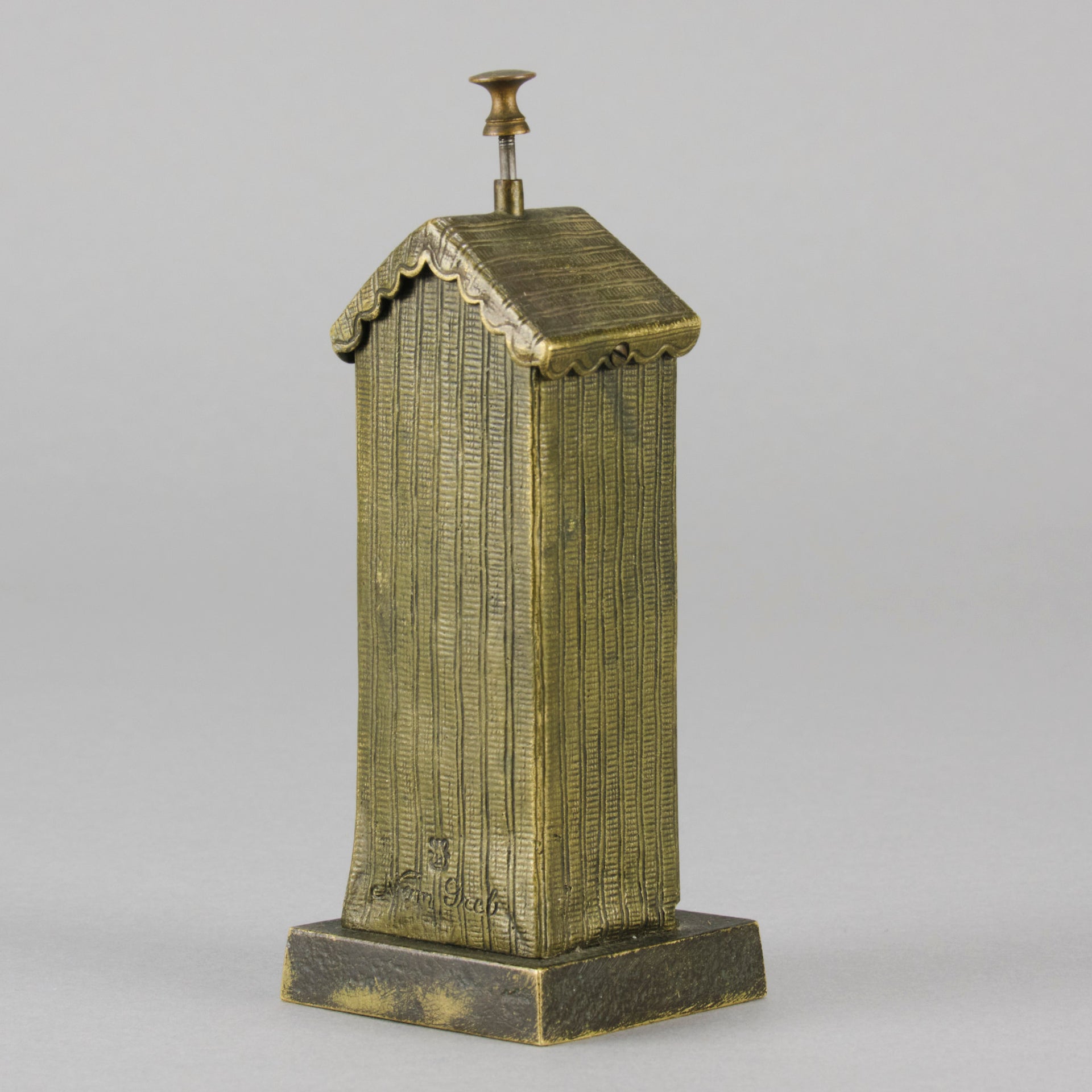 Bathing Belle by Franz Bergman an amusingly erotic early 20th Century Austrian bronze figure of a young beauty in a seaside hut peeking out between the curtains. The mechanism pushes down to turn the front curtain around revealing 'what the butler saw' as her naked body is revealed from behind