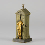 Bathing Belle by Franz Bergman an amusingly erotic early 20th Century Austrian bronze figure of a young beauty in a seaside hut peeking out between the curtains. The mechanism pushes down to turn the front curtain around revealing 'what the butler saw' as her naked body is revealed from behind