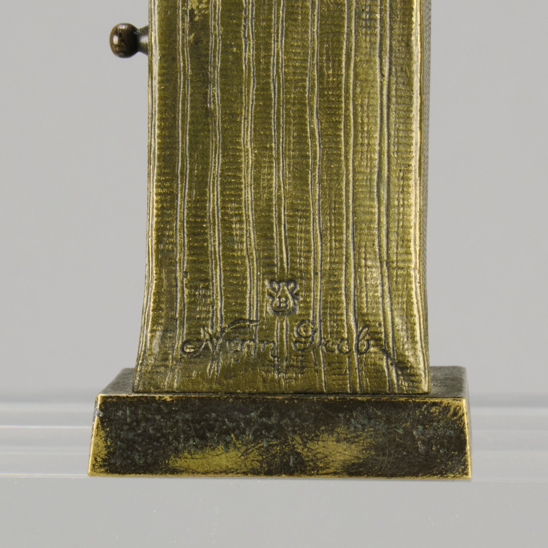 Bathing Belle by Franz Bergman an amusingly erotic early 20th Century Austrian bronze figure of a young beauty in a seaside hut peeking out between the curtains. The mechanism pushes down to turn the front curtain around revealing 'what the butler saw' as her naked body is revealed from behind