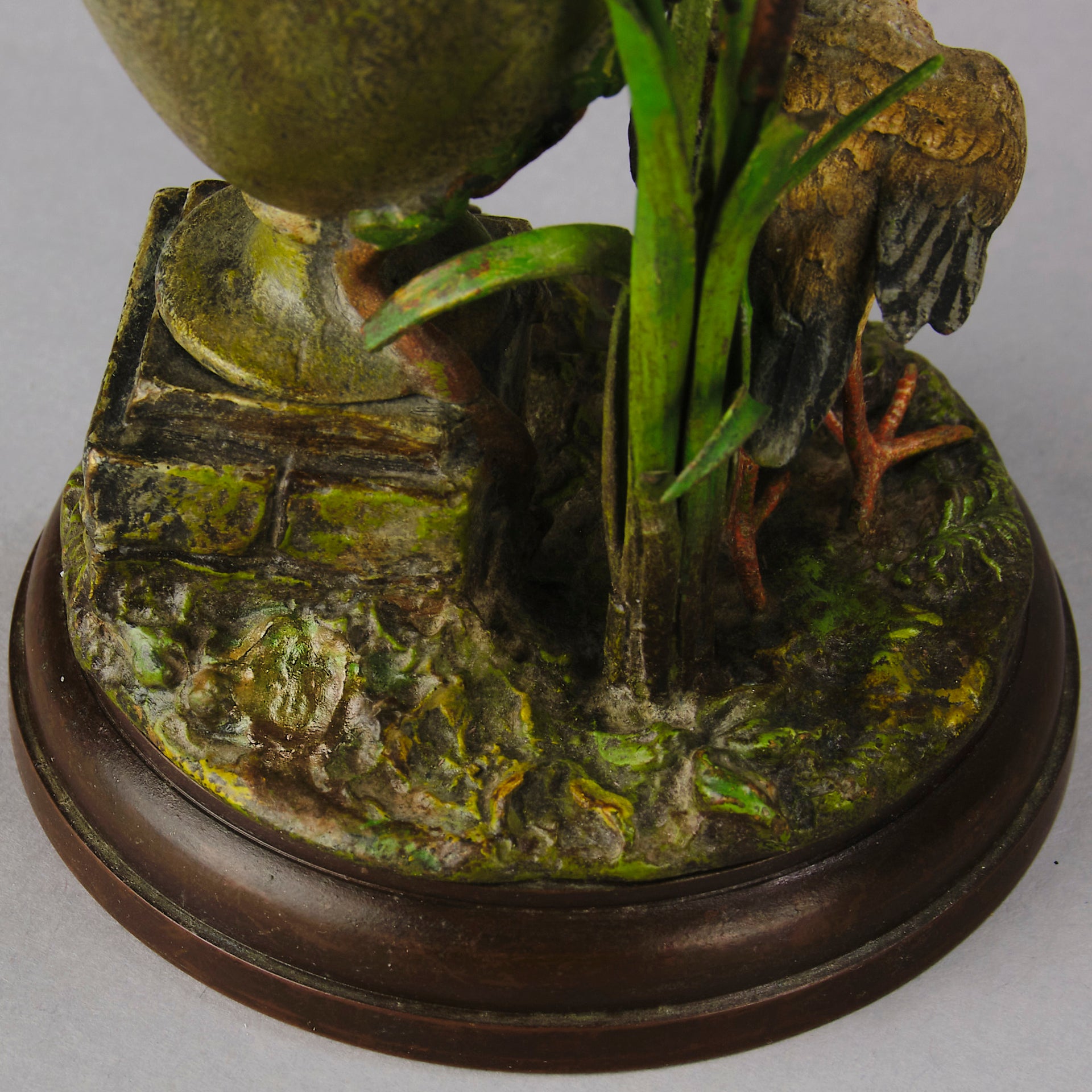 A Pair of Bird Vases by Franz Bergman decorated with Ibis standing amongst bulrush raised on a naturalistic bases with very fine colours and good hand finished surface detail 