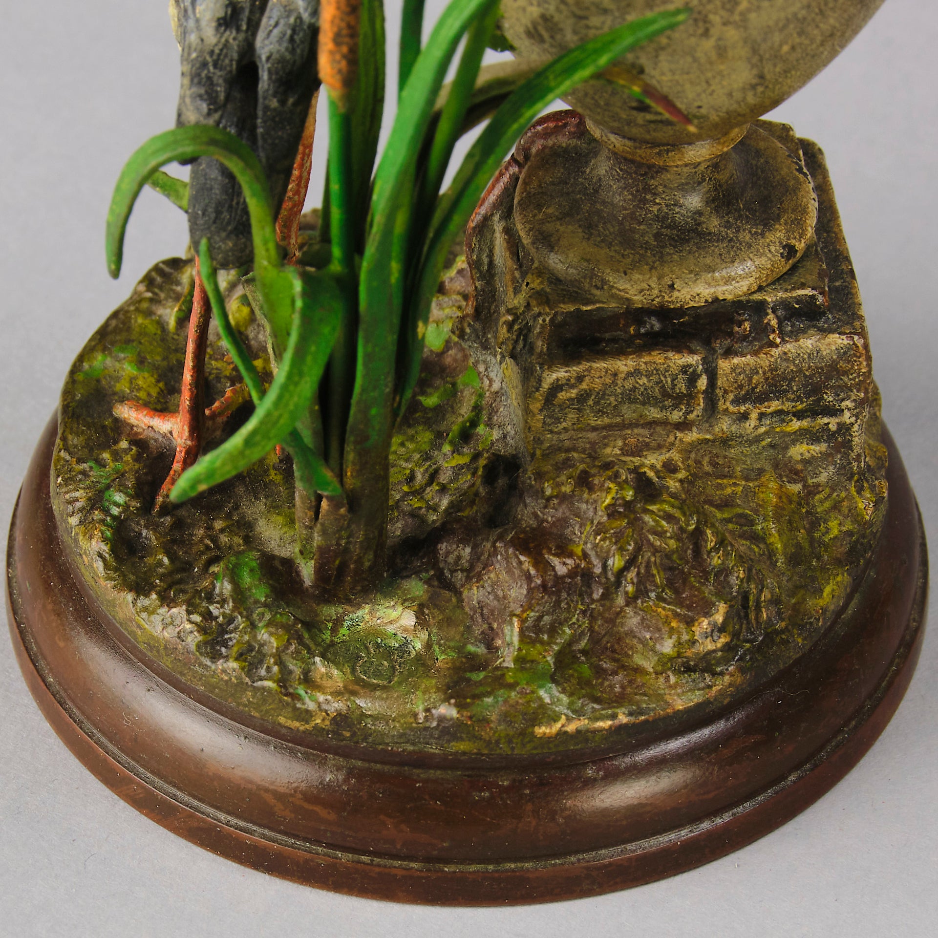 A Pair of Bird Vases by Franz Bergman decorated with Ibis standing amongst bulrush raised on a naturalistic bases with very fine colours and good hand finished surface detail 