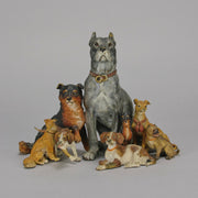 Group of 8 seated dogs of various breeds in cold painted bronze by Franz Bergman with excellent naturalistic colour and fine hand chased surface detail