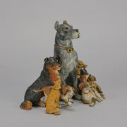 Group of 8 seated dogs of various breeds in cold painted bronze by Franz Bergman with excellent naturalistic colour and fine hand chased surface detail