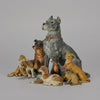 Group of 8 seated dogs of various breeds in cold painted bronze by Franz Bergman with excellent naturalistic colour and fine hand chased surface detail