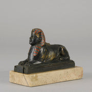 Erotic Sphinx by Franz Bergman a charming and erotic late 19th Century Austrian cold painted bronze figure of a recumbent sphinx, hinged and opening to reveal a naked beauty seated on a rug with gilt and enamel colour