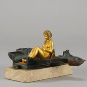 Erotic Sphinx by Franz Bergman a charming and erotic late 19th Century Austrian cold painted bronze figure of a recumbent sphinx, hinged and opening to reveal a naked beauty seated on a rug with gilt and enamel colour