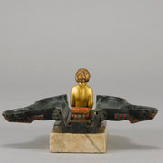 Erotic Sphinx by Franz Bergman a charming and erotic late 19th Century Austrian cold painted bronze figure of a recumbent sphinx, hinged and opening to reveal a naked beauty seated on a rug with gilt and enamel colour