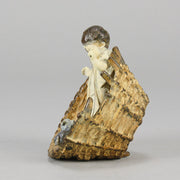 Girl & Cat with Basket - Bergman Bronze - A charming early 20th Century Austrian bronze group study of a young child and cat standing in a wicker basket playing with a ball of string - Hickmet Fine Arts