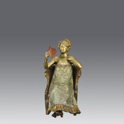 Lady Reading by Franz Bergman an attractive early 20th Century Austrian bronze study of a seated lady wearing a loosley fitted night dress reading a book, her dress lifting to reveal her beautiful body