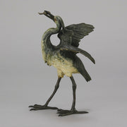 A Standing Stork with Fish Antique Bronze Statue by Franz Bergman exhibiting very fine cold painted colours and good hand finished surface detail