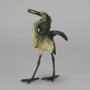 A Standing Stork with Fish Antique Bronze Statue by Franz Bergman exhibiting very fine cold painted colours and good hand finished surface detail