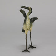 A Standing Stork with Fish Antique Bronze Statue by Franz Bergman exhibiting very fine cold painted colours and good hand finished surface detail