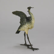 A Standing Stork with Fish Antique Bronze Statue by Franz Bergman exhibiting very fine cold painted colours and good hand finished surface detail
