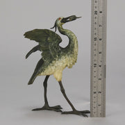 A Standing Stork with Fish Antique Bronze Statue by Franz Bergman exhibiting very fine cold painted colours and good hand finished surface detail