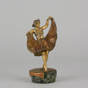 Windy Day by Franz Bergman a sensuous early 20th century erotic Austrian bronze figurine of a beautiful dancer dressed in an Oriental outfit, the skirt hinged to lift and reveal her naked bod