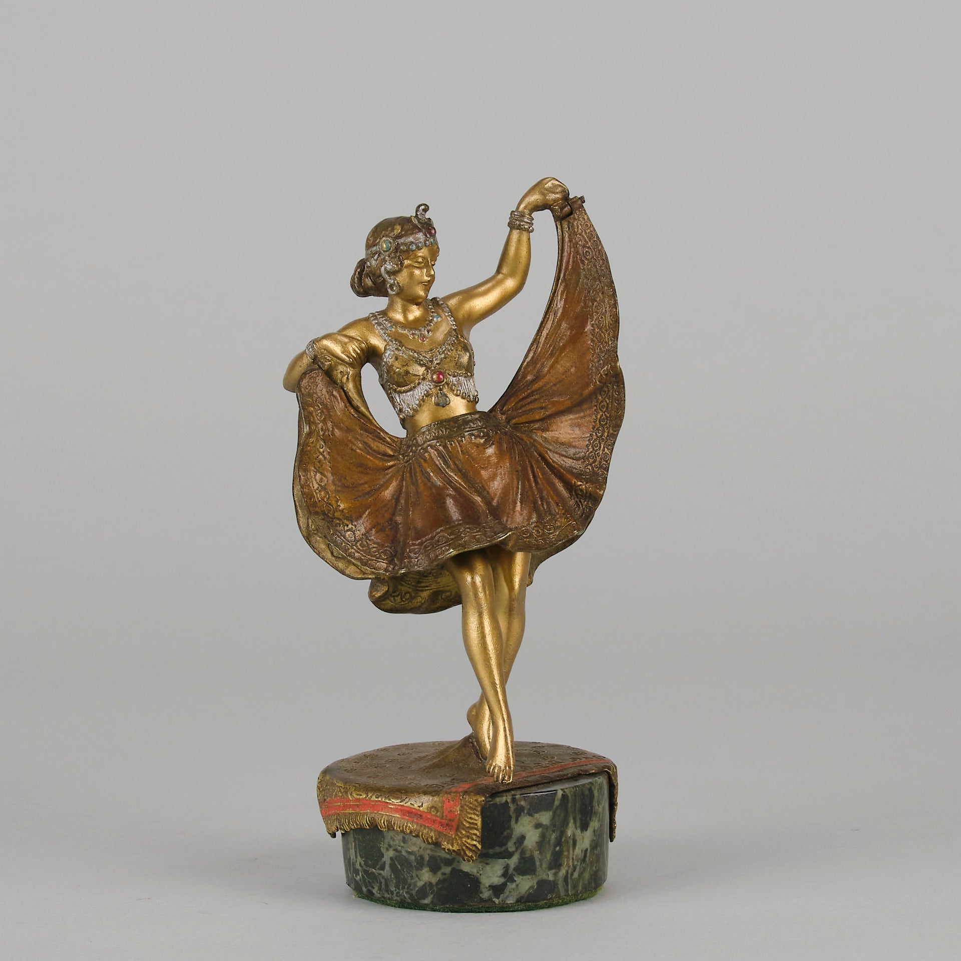 Windy Day by Franz Bergman a sensuous early 20th century erotic Austrian bronze figurine of a beautiful dancer dressed in an Oriental outfit, the skirt hinged to lift and reveal her naked bod