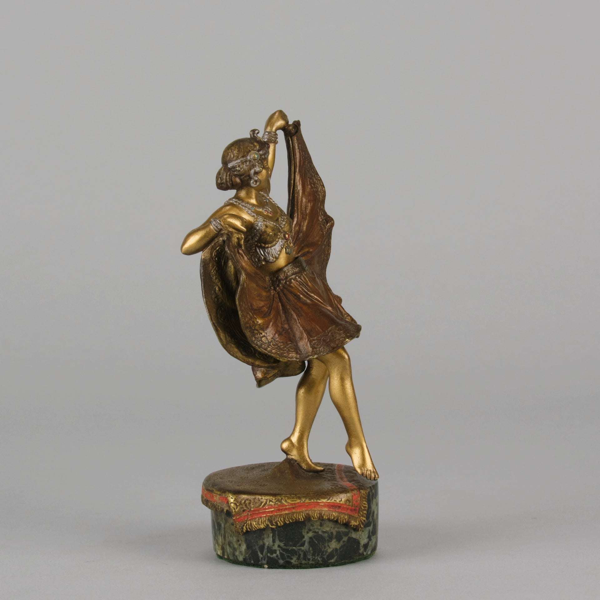 Windy Day by Franz Bergman a sensuous early 20th century erotic Austrian bronze figurine of a beautiful dancer dressed in an Oriental outfit, the skirt hinged to lift and reveal her naked bod