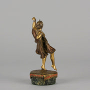 Windy Day by Franz Bergman a sensuous early 20th century erotic Austrian bronze figurine of a beautiful dancer dressed in an Oriental outfit, the skirt hinged to lift and reveal her naked bod