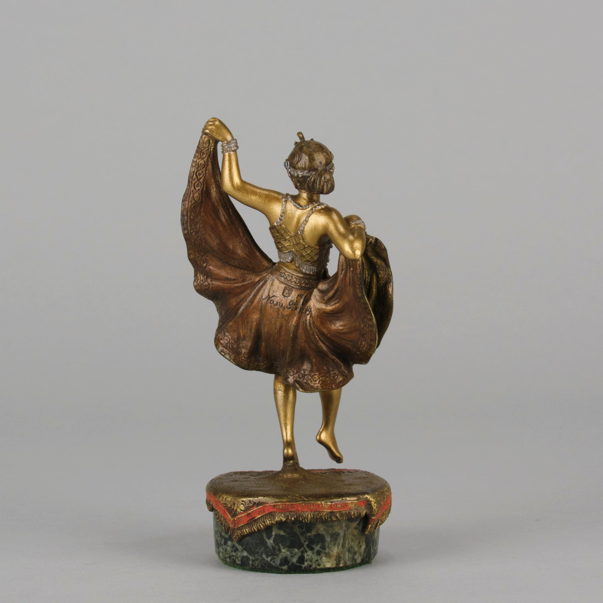 Windy Day by Franz Bergman a sensuous early 20th century erotic Austrian bronze figurine of a beautiful dancer dressed in an Oriental outfit, the skirt hinged to lift and reveal her naked bod