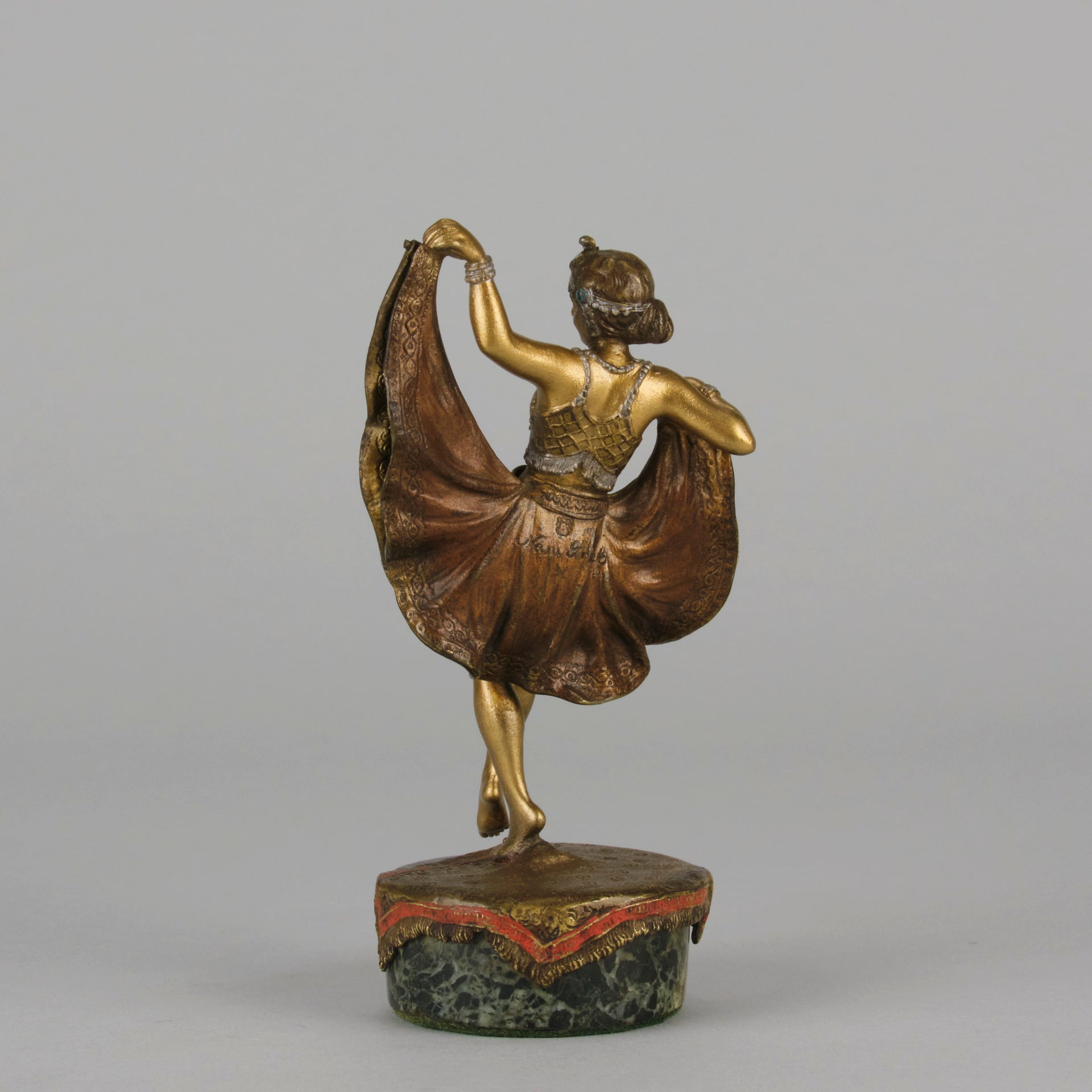 Windy Day by Franz Bergman a sensuous early 20th century erotic Austrian bronze figurine of a beautiful dancer dressed in an Oriental outfit, the skirt hinged to lift and reveal her naked bod