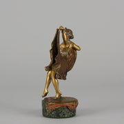 Windy Day by Franz Bergman a sensuous early 20th century erotic Austrian bronze figurine of a beautiful dancer dressed in an Oriental outfit, the skirt hinged to lift and reveal her naked bod