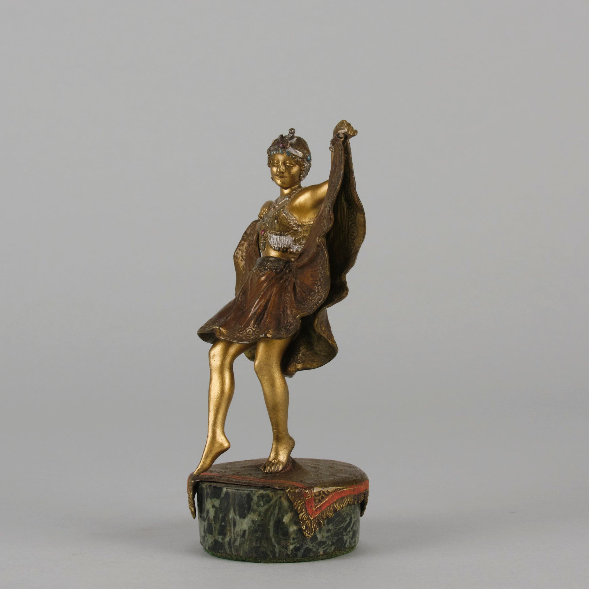 Windy Day by Franz Bergman a sensuous early 20th century erotic Austrian bronze figurine of a beautiful dancer dressed in an Oriental outfit, the skirt hinged to lift and reveal her naked bod