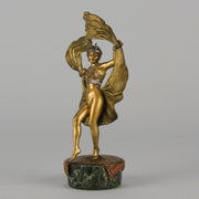 Windy Day by Franz Bergman a sensuous early 20th century erotic Austrian bronze figurine of a beautiful dancer dressed in an Oriental outfit, the skirt hinged to lift and reveal her naked bod