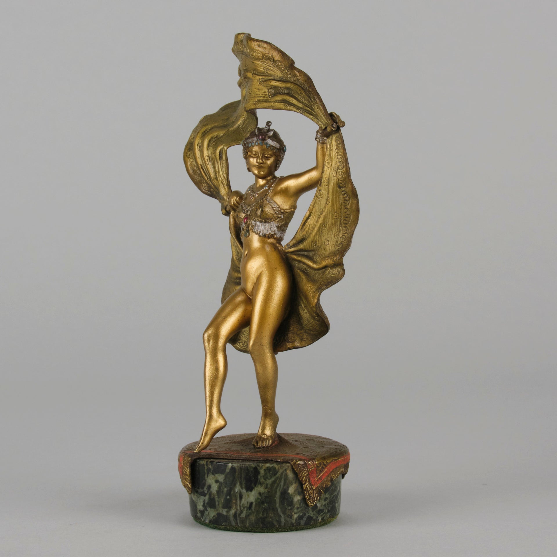 Windy Day by Franz Bergman a sensuous early 20th century erotic Austrian bronze figurine of a beautiful dancer dressed in an Oriental outfit, the skirt hinged to lift and reveal her naked bod