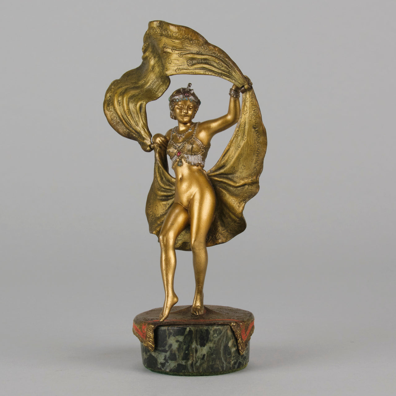 Windy Day by Franz Bergman a sensuous early 20th century erotic Austrian bronze figurine of a beautiful dancer dressed in an Oriental outfit, the skirt hinged to lift and reveal her naked bod