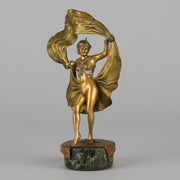 Windy Day by Franz Bergman a sensuous early 20th century erotic Austrian bronze figurine of a beautiful dancer dressed in an Oriental outfit, the skirt hinged to lift and reveal her naked bod