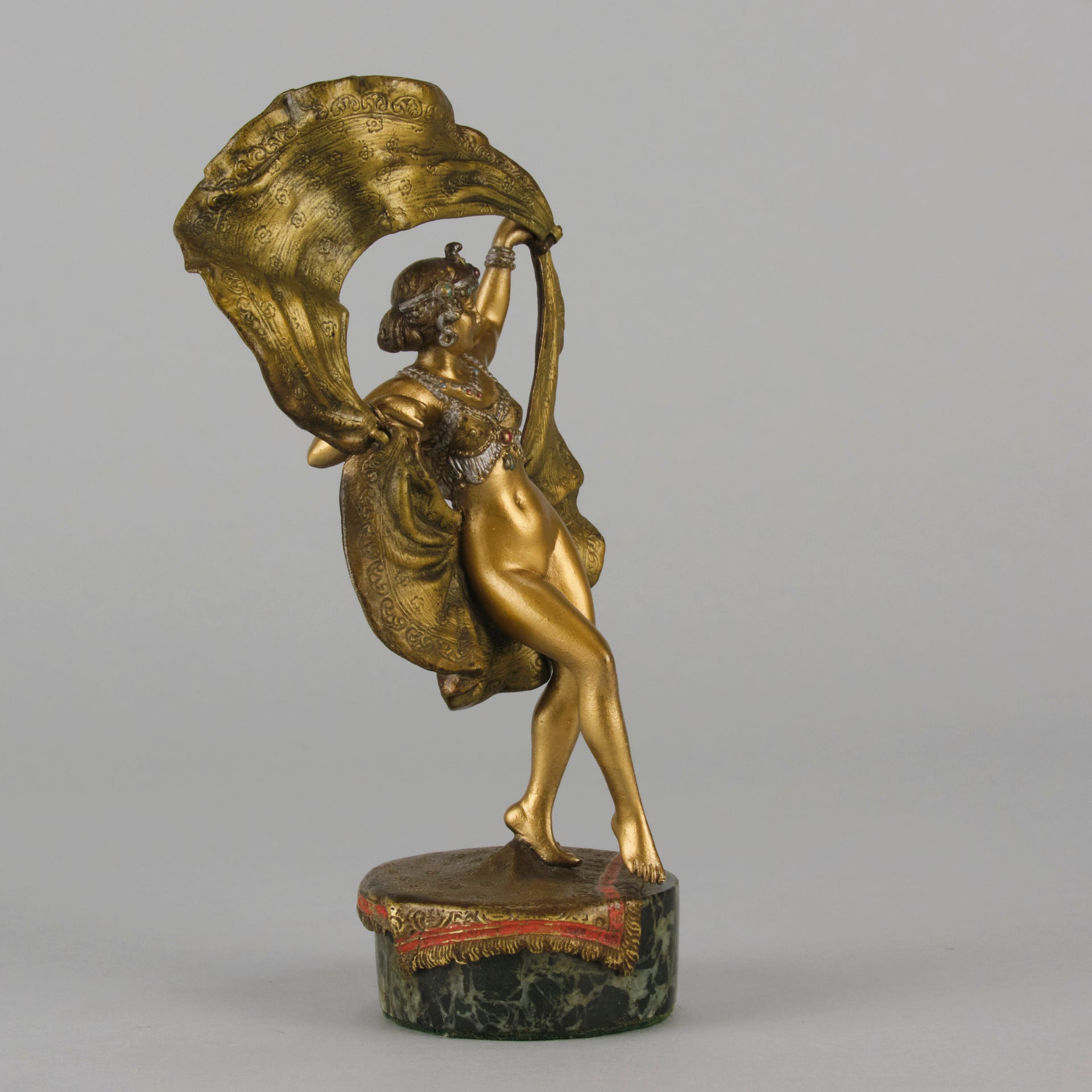 Windy Day by Franz Bergman a sensuous early 20th century erotic Austrian bronze figurine of a beautiful dancer dressed in an Oriental outfit, the skirt hinged to lift and reveal her naked bod