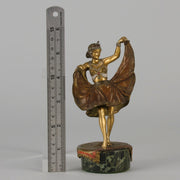 Windy Day by Franz Bergman a sensuous early 20th century erotic Austrian bronze figurine of a beautiful dancer dressed in an Oriental outfit, the skirt hinged to lift and reveal her naked bod