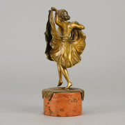 Windy Day by Franz Bergman a sensuous early 20th century erotic Austrian bronze figurine of a young dancer with fine cold painted colour and good detail, the skirt hinged to lift and reveal her naked body
